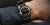 Green NATO watch strap fitted to a mechanical Yema wrist watch