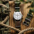 Woven camouflage NATO watch strap with stainless steel satin metal fittings