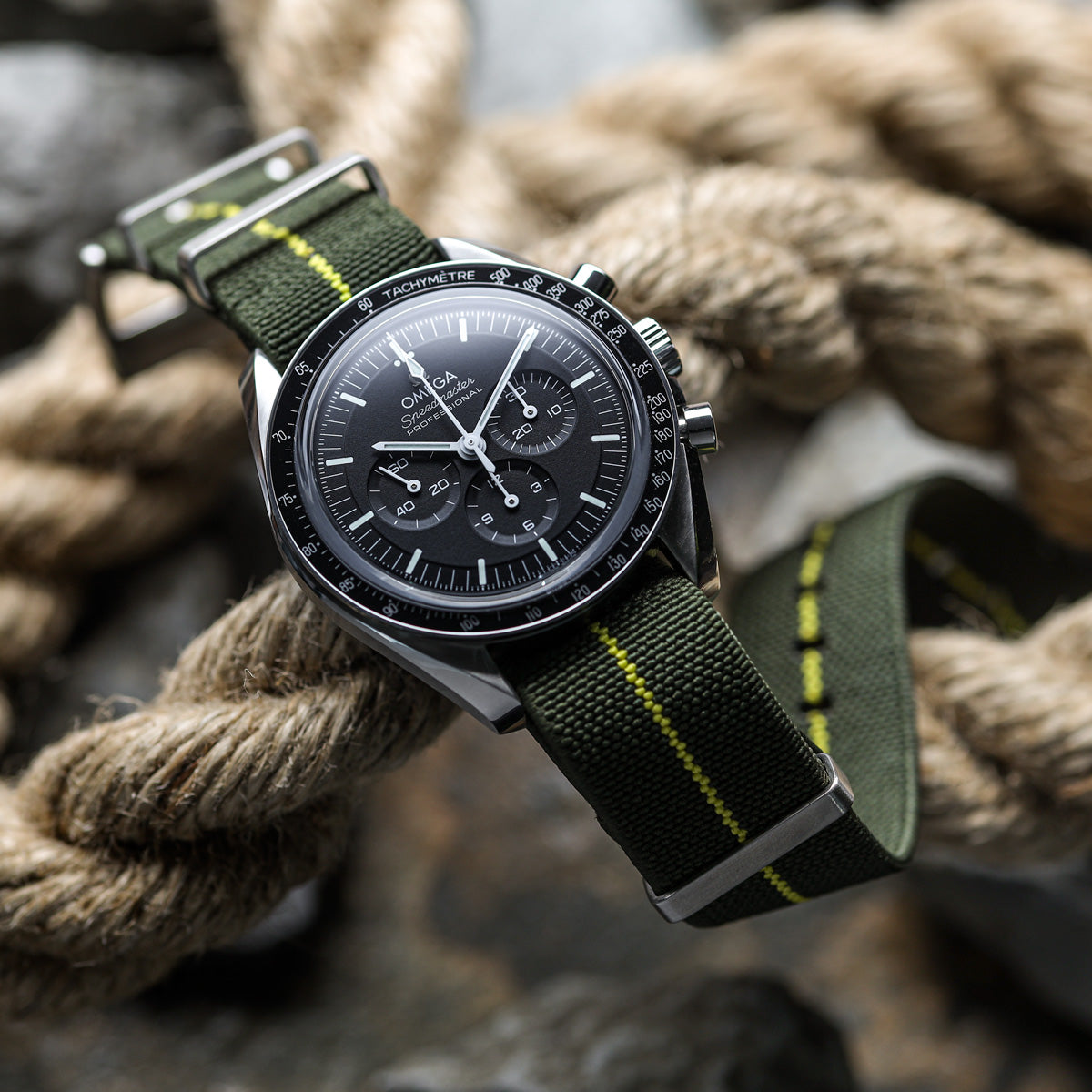 https://www.zuludiver.com/cdn/shop/files/Omega-Speedmaster-3861-Green-Yellow-E-NATO_f1f01bde-60fc-42dd-9c36-a627d3282050_1200x.jpg?v=1710772717