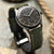 Green Cordura sailcloth watch strap with beige stitching
