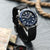 Black Maverick sailcloth watch strap with silver buckle on a white background