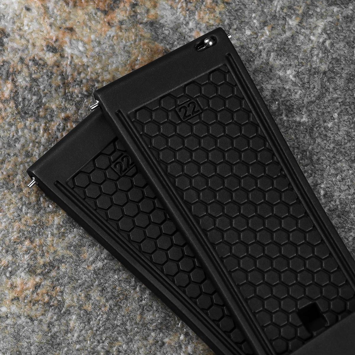 Quick release watch spring bars fitted to a FKM rubber honeycombe pattern watch strap